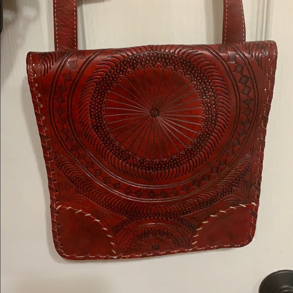 Leaders in leather red crossbody bag